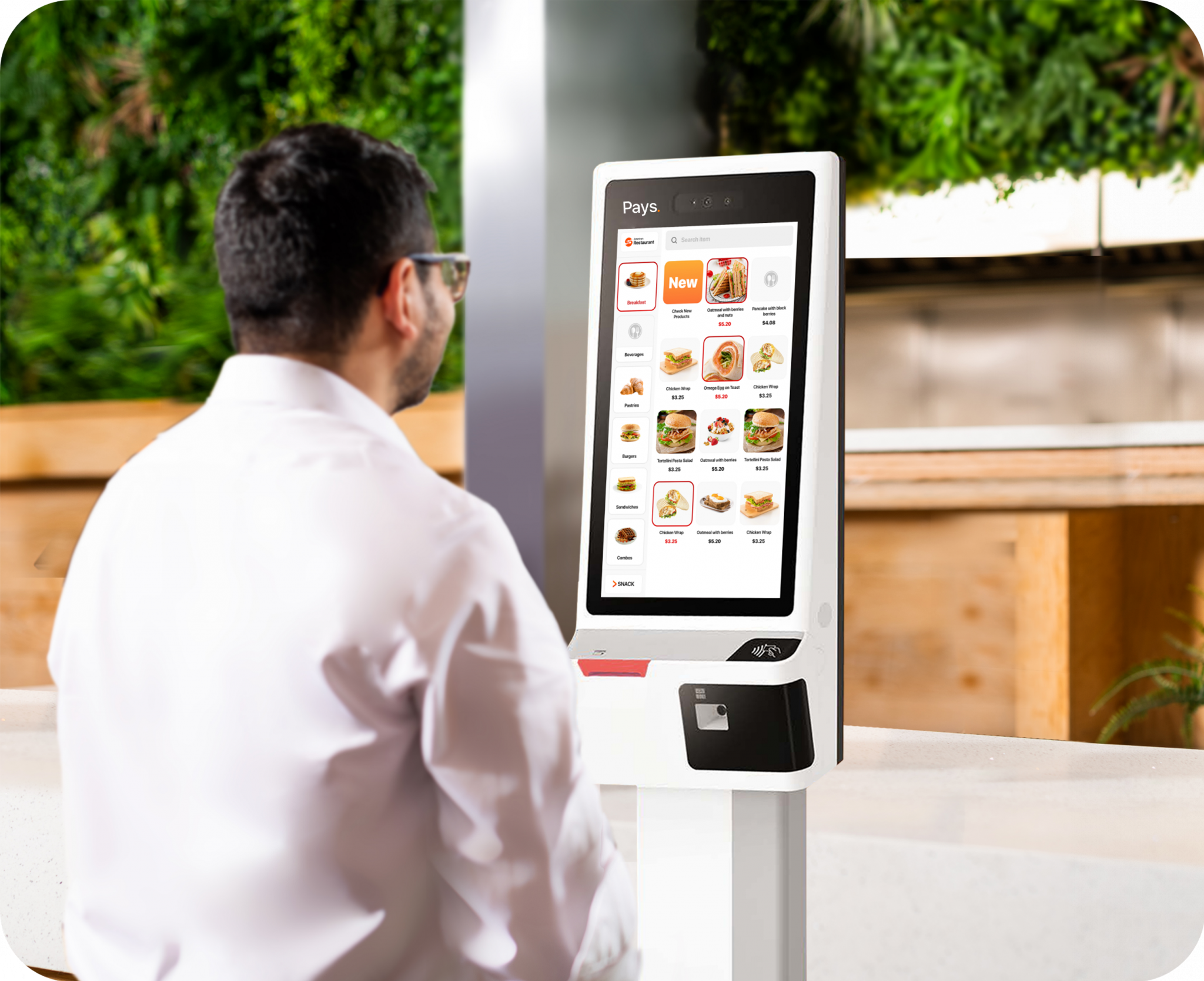 Self-order kiosks and self-order POS system in a restaurant, streamlining the ordering process and enhancing efficiency.