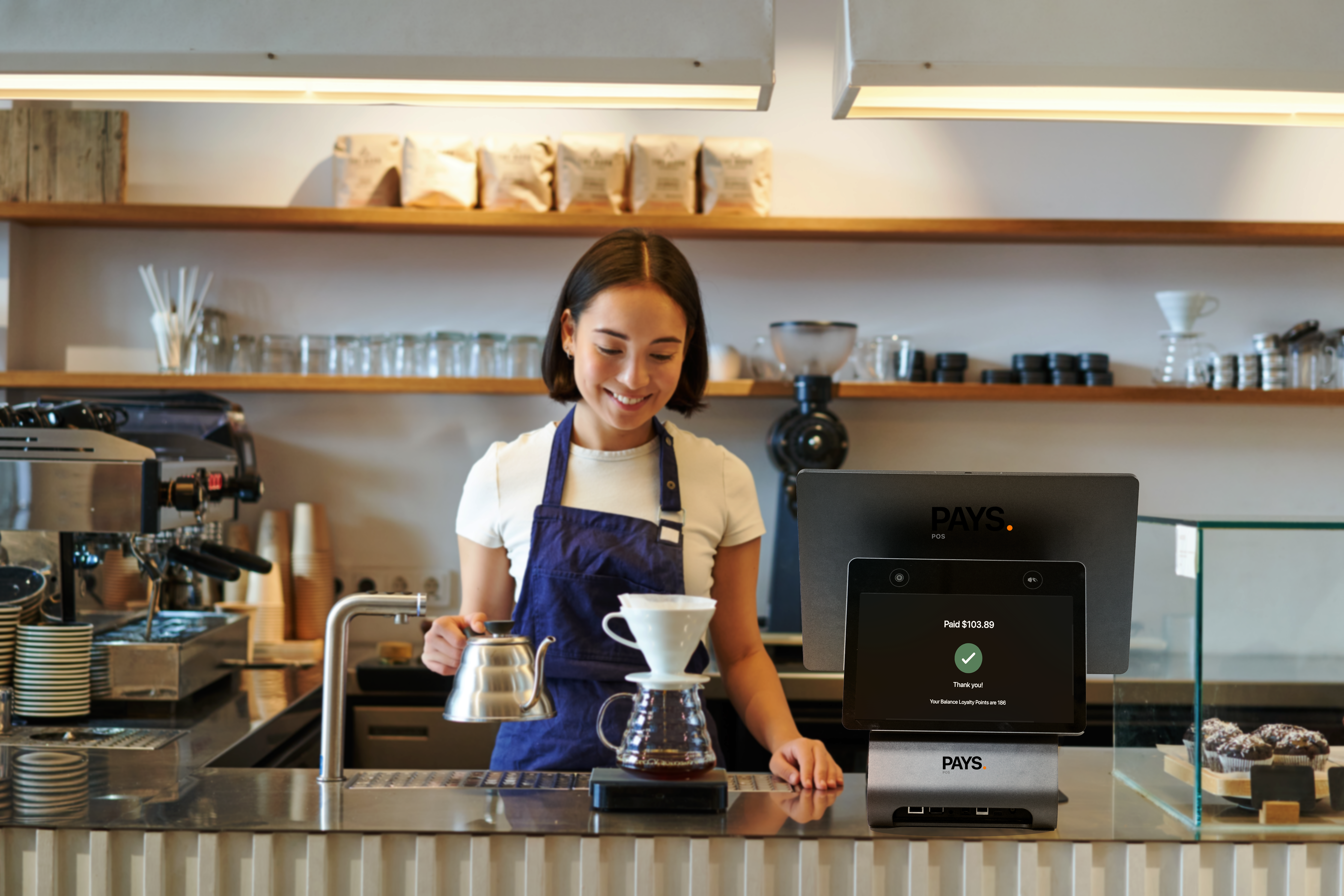 Barista creating beautiful latte art, showcasing the craft and creativity of coffee preparation.